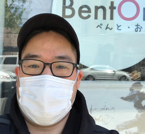 A man wearing a mask outside of BentOn