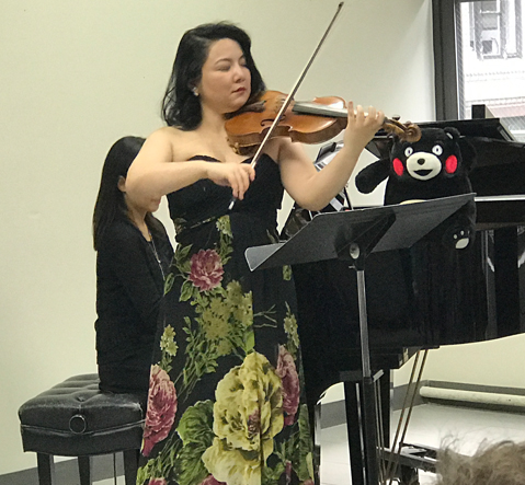 A woman playing music